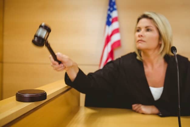 A gavel hitting a sound block, representing regulatory oversight and judicial decisions related to overdraft fee policies.