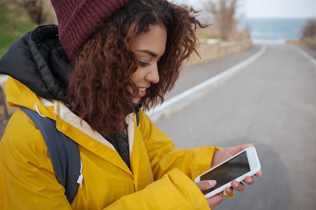 A person using a mobile app to track their expenses, showing categories like 