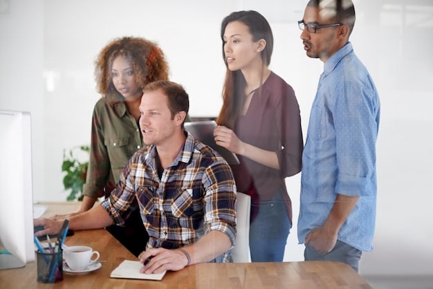 A photo of a group of employees smiling and collaborating on a project in a modern, well-lit office. The atmosphere is positive and energetic, representing improved morale and productivity as a result of wellness initiatives.