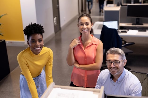 A diverse group of employees in a modern office setting, smiling and engaged in a benefits presentation, highlighting the appeal of personalized voluntary benefit options.