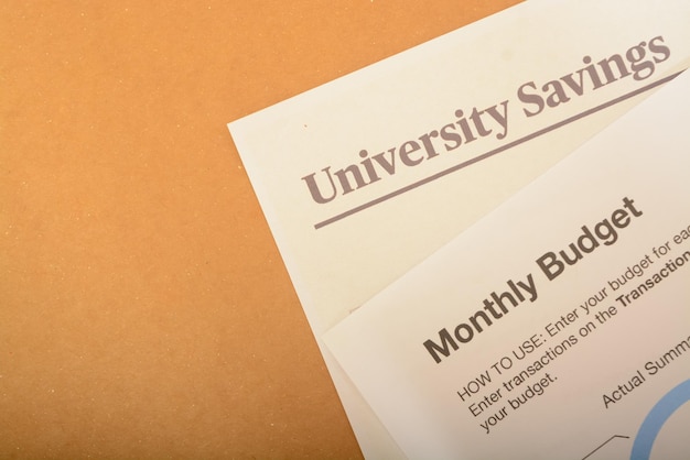 A close-up of a tuition bill or college financial aid statement showing a significant reduction in the amount owed, possibly highlighting the savings achieved through dual enrollment or early college credit programs. The bill might be partially obscured to keep the focus on the amount saved.