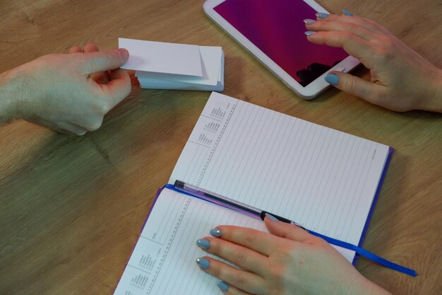 A close-up of a FAFSA application form (either physical or digital), with a person's hand hovering over it, as if they are about to fill it out. The focus is on the section related to income and assets, highlighting the importance of accurate financial information.