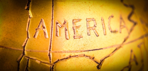 A close-up shot of a U.S. Series EE savings bond, highlighting the security features and official markings.