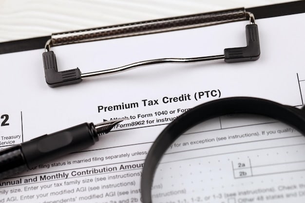 A close-up of a tax form highlighting the section for Child Tax Credit, with a pen resting on it, emphasizing accurate completion and attention to detail.